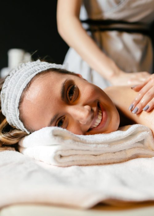 Beautiful woman enjoying massage and rejuvenating